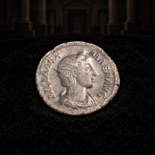 Representative coin obverse resting on black velvet with an illustrative historical background — Julia Mamaea Ancient Roman Silver Denarius — Mother of Severus Alexander (AD 222–235) — NGC Certified
