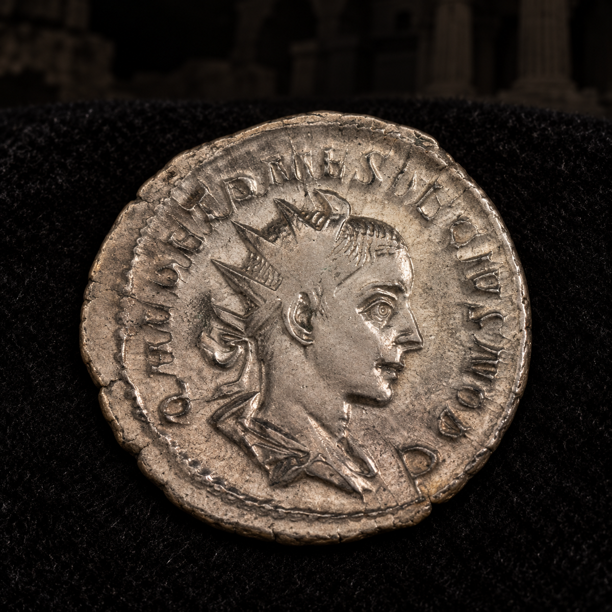 Styled coin preview on black velvet with an illustrative historical background — Herennius Etruscus Antoninianus — NGC