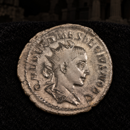 Styled coin preview on black velvet with an illustrative historical background — Herennius Etruscus Antoninianus — NGC