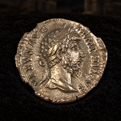 Styled coin preview on black velvet with an illustrative historical background — Lucius Verus Silver Denarius — NGC Certified